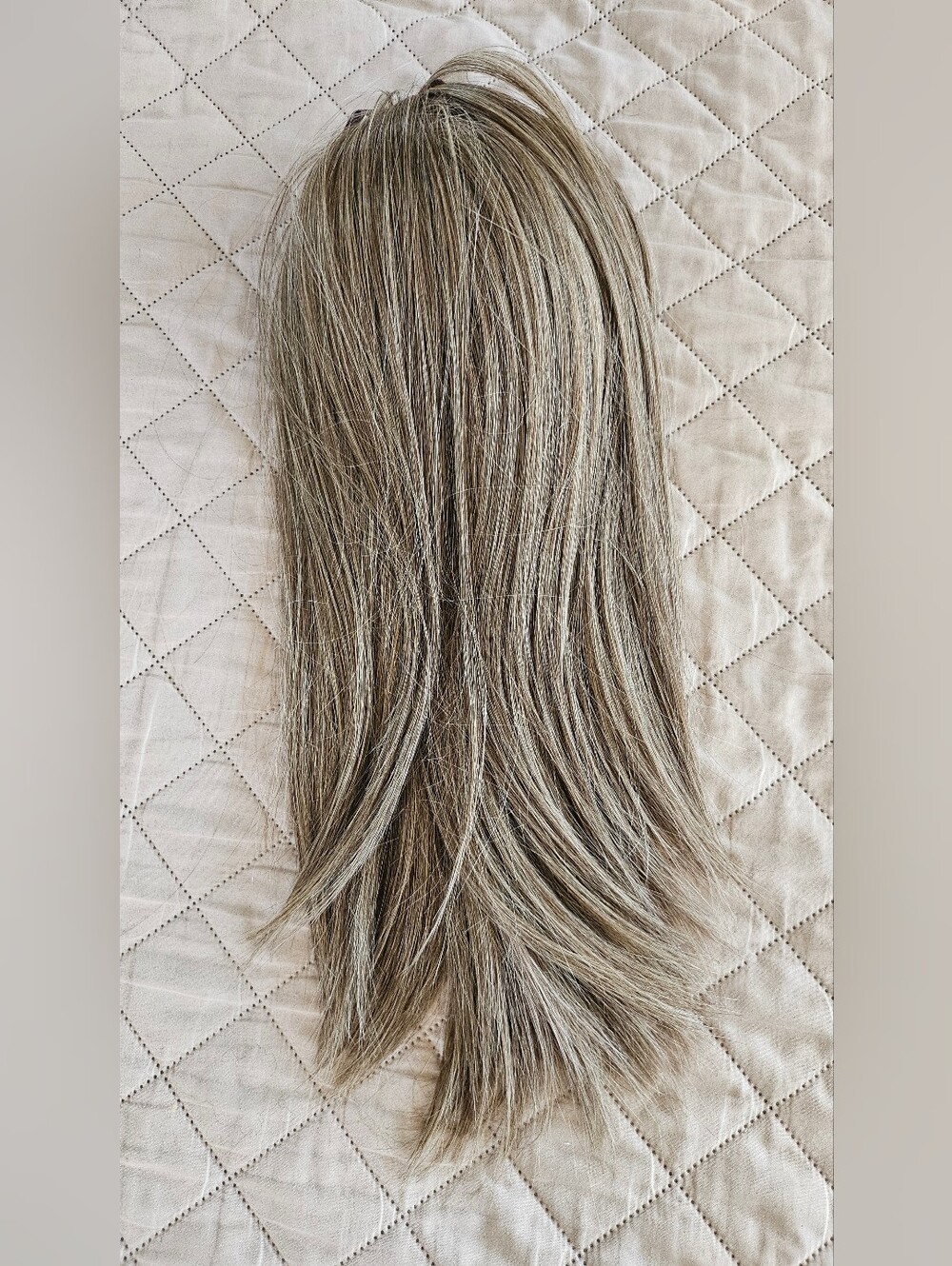 Hair piece, i believe the color may be ash blonde or a light brown. - Picture 2 of 6